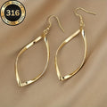 Twisted Sculpted Oval Silver Drop Earrings